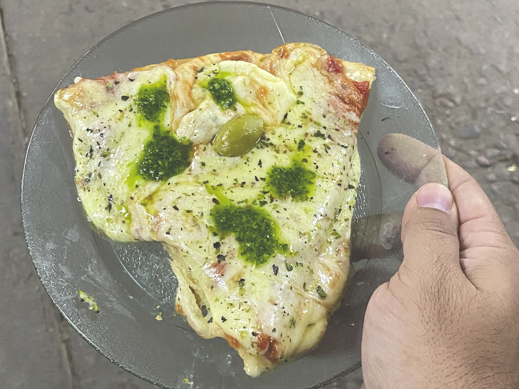 pizza con mucho queso en Buenos Aires